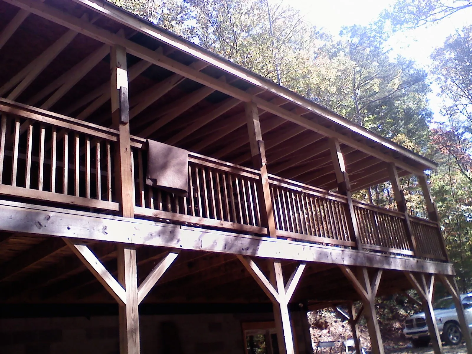 Timber framing under a new elevated porch and deck — Roof Leak Repair in Converse by Roofing Brothers